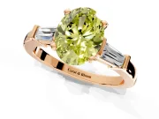3 Stone Engagement Ring Setting for Fancy Yellow Oval Center with Channel Baguette Accents and Prong Head in Rose Gold