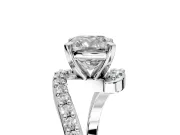 Solitaire Engagement Ring Setting for Cushion Cut Center with Pave Bypass Swirl Band and Prong Head in Platinum