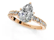 Solitaire Engagement Ring Setting for Pear-Shaped Center with Fine Pave Band and Claw Prong Head in Rose Gold