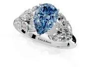 Leaf Cluster Engagement Ring Setting for Fancy Blue Pear-Shaped Center with Marquise Accents and Prong Head in Platinum