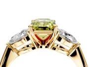 3 Stone Engagement Ring Setting for Fancy Yellow Emerald Cut Center with Large Pear-Shaped Accents and Prong Head in Yellow Gold