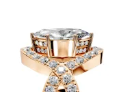 Halo Engagement Ring Setting for Marquise Center with Pave Infinity Twist Band and Prong Head in Rose Gold