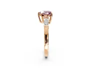 3 Stone Engagement Ring Setting for Fancy Pink Heart-Shaped Center with Baguette Accents and Prong Head in Rose Gold