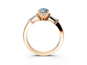 3 Stone Engagement Ring Setting for Fancy Blue Pear-Shaped Center with Channel Baguette Accents and Prong Head in Rose Gold