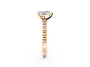 Solitaire Engagement Ring Setting for Pear-Shaped Center with Bezel-Dot Beaded Band and Prong Head in Rose Gold