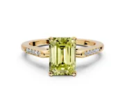 Solitaire Engagement Ring Setting for Fancy Yellow Emerald Cut Center with Channel Accents and Prong Head in Yellow Gold