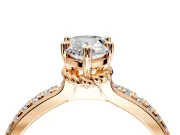Solitaire Engagement Ring Setting for Pear-Shaped Center with Raised Channel Band and Prong Head in Rose Gold