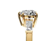3 Stone Engagement Ring Setting for Heart-Shaped Center with Baguette Accents and Prong Head in Yellow Gold