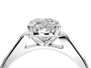 Solitaire Engagement Ring Setting for Cushion Cut Center with Channel Accents and Prong Head in Platinum