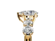 5 Stone Engagement Ring Setting for Pear-Shaped Center with Graduated Accents and Prong Head in Yellow Gold