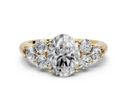 Cluster Engagement Ring Setting for Oval Center with Round Cut Accent Frame and Prong Head in Yellow Gold