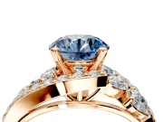 Halo Engagement Ring Setting for Fancy Blue Round Cut Center with Marquise and Pave Bypass Band and Prong Head in Rose Gold