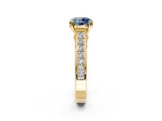 Solitaire Engagement Ring Setting for Fancy Blue Round Cut Center with Channel Band and Double Claw Prong Head in Yellow Gold