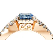 Halo Engagement Ring Setting for Fancy Blue Emerald Cut Center with Wide-Open Pave Split Shank and Prong Head in Rose Gold