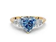 3 Stone Engagement Ring Setting for Fancy Blue Heart-Shaped Center with Large Pear-Shaped Accents and Prong Head in Yellow Gold