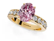 Solitaire Engagement Ring Setting for Fancy Pink Oval Center with Channel-Set Accents and Prong Head in Yellow Gold