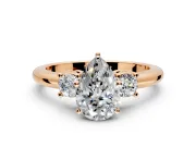 3 Stone Engagement Ring Setting for Pear-Shaped Center with Wide Plain Band and Prong Head in Rose Gold