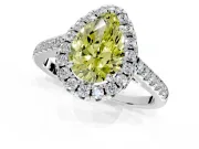 Halo Engagement Ring Setting for Fancy Yellow Pear-Shaped Center with Raised Halo, Pave Band and Prong Head in Platinum