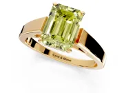 Solitaire Engagement Ring Setting for Fancy Yellow Emerald Cut Center with Tapered Split Shoulders and Prong Head in Yellow Gold
