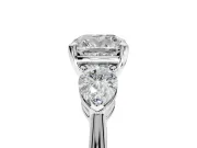 3 Stone Engagement Ring Setting for Cushion Cut Center with Large Pear-Shaped Accents and Prong Head in Platinum