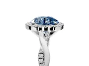 Halo Engagement Ring Setting for Fancy Blue Round Cut Center with Pave and Plain Twist Band and Prong Head in Sterling Silver