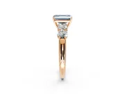5 Stone Engagement Ring Setting for Fancy Blue Emerald Cut Center with Graduated Accents and Prong Head in Rose Gold