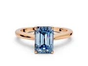 Solitaire Engagement Ring Setting for Fancy Blue Emerald Cut Center with Narrow Cathedral Band and Prong Head in Rose Gold