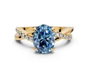 Solitaire Engagement Ring Setting for Fancy Blue Oval Center with Half-Pave Crossover Band and Prong Head in Yellow Gold