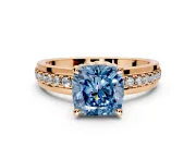Solitaire Engagement Ring Setting for Fancy Blue Cushion Cut Center with Raised Channel Band and Prong Head in Rose Gold