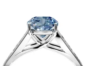 Solitaire Engagement Ring Setting for Fancy Blue Cushion Cut Center with Round Cut Channel Band and Prong Head in White Gold