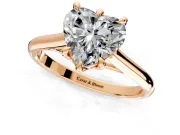 Solitaire Engagement Ring Setting for Heart-Shaped Center with Cathedral Band and Prong Head in Rose Gold