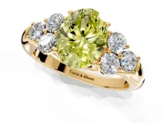 Cluster Engagement Ring Setting for Fancy Yellow Oval Center with Round Cut Accent Frame and Prong Head in Yellow Gold
