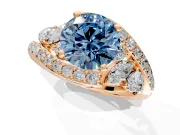 Halo Engagement Ring Setting for Fancy Blue Round Cut Center with Marquise and Pave Bypass Band and Prong Head in Rose Gold