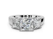 3 Stone Engagement Ring Setting for Princess Cut Center with Raised Basket Heads and Prong Head in Platinum