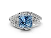 Halo Engagement Ring Setting for Fancy Blue Princess Cut Center with Marquise and Pave Bypass Band and Prong Head in White Gold