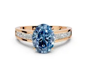 Solitaire Engagement Ring Setting for Fancy Blue Oval Center with Princess Cut Channel Band and Prong Head in Rose Gold