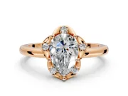 Floral Frame Engagement Ring Setting for Pear-Shaped Center with Accent Clusters and Prong Head in Rose Gold