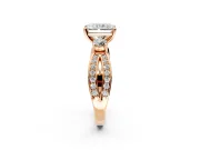 3 Stone Engagement Ring Setting for Radiant Cut Center with Pave Twist Band and Prong Head in Rose Gold