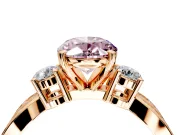 3 Stone Engagement Ring Setting for Fancy Pink Oval Center with Pave Twist Band and Prong Head in Rose Gold