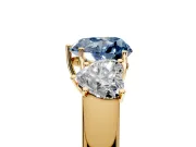 3 Stone Engagement Ring Setting for Fancy Blue Heart-Shaped Center with Raised Basket Heads and Prong Head in Yellow Gold
