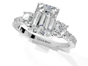 3 Stone Engagement Ring Setting for Emerald Cut Center with Round Cut Side Accents and Prong Head in Platinum