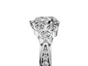Cluster Engagement Ring Setting for Heart-Shaped Center with Bezel Accent Clusters and Prong Head in Platinum