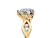 Solitaire Engagement Ring Setting for Heart-Shaped Center with Accented Twist Band and Leaf Prong Head in Yellow Gold
