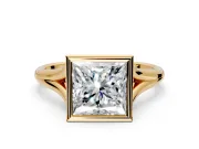 Solitaire Engagement Ring Setting for Princess Cut Center with V Split Shank and Bezel Head in Yellow Gold