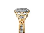 Cluster Engagement Ring Setting for Emerald Cut Center with Bezel Accent Clusters and Prong Head in Yellow Gold