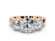 3 Stone Engagement Ring Setting for Round Cut Center with Raised Basket Heads and Prong Head in Rose Gold
