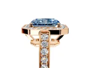Bezel-Framed Halo Engagement Ring Setting for Fancy Blue Radiant Cut Center with Pave Band and Prong Head in Rose Gold