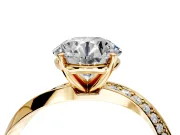 Side Accent Engagement Ring Setting for Round Cut Center with Accent Shoulders and Prong Head in Yellow Gold