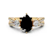 3 Stone Engagement Ring Setting for Fancy Black Pear-Shaped Center with Pave Split Shank and Prong Head in Yellow Gold