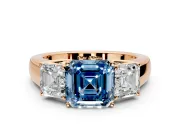 3 Stone Engagement Ring Setting for Fancy Blue Asscher Cut Center with Raised Basket Heads and Prong Head in Rose Gold